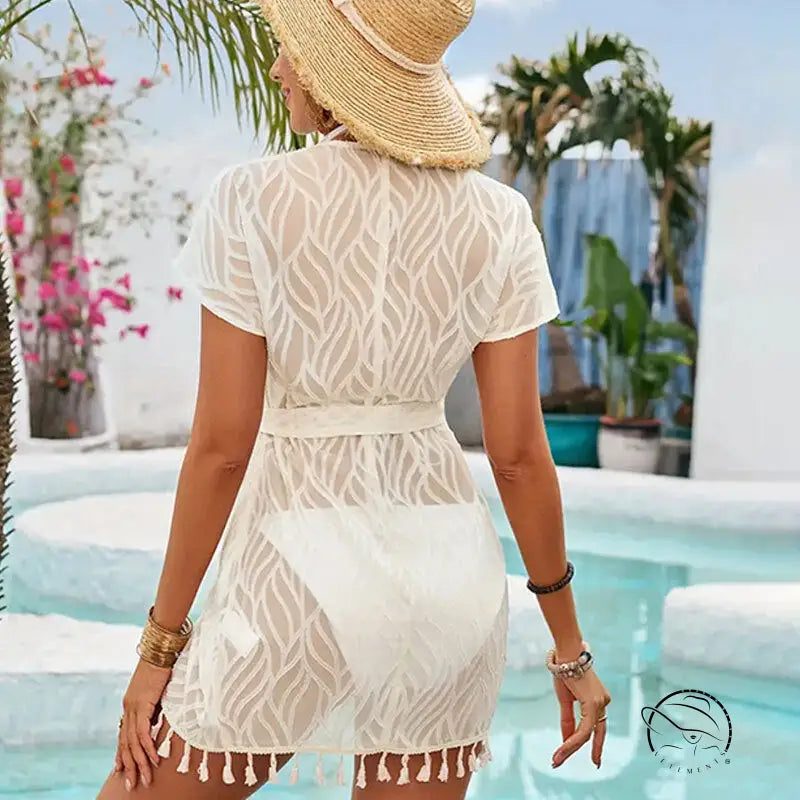 Cute boho white lace beach dress with short sleeve length and tassel trim