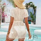 Cute boho white lace beach dress with short sleeve length and tassel trim