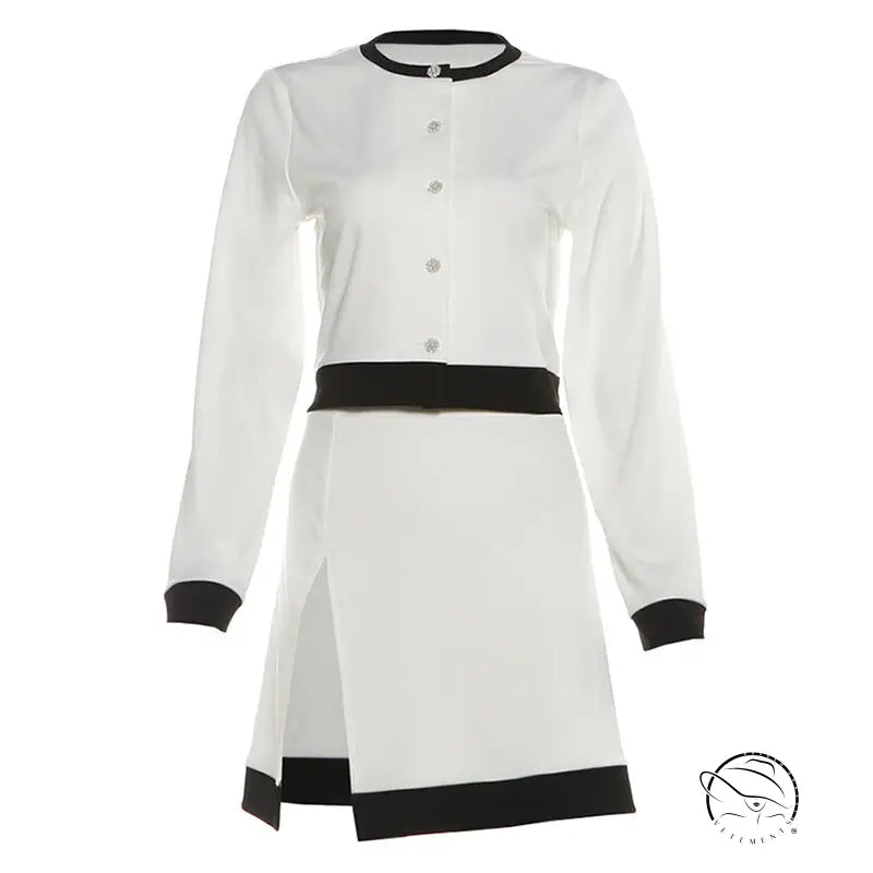 Elegant white and black long sleeve top with short skirt set