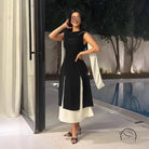 Elegant black and white langry fashion dress with asymmetrical hemline