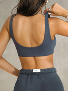 Langry dark gray minimalist sports bra with wide straps and backless design