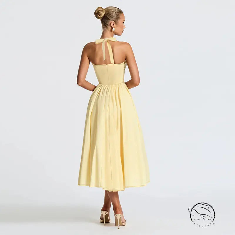 Yellow satin halter neck dress with bow back detail, Langry fashion evening maxi