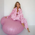 Lavender langry fashion pajamas with cloud bean bag chair and pink lips design
