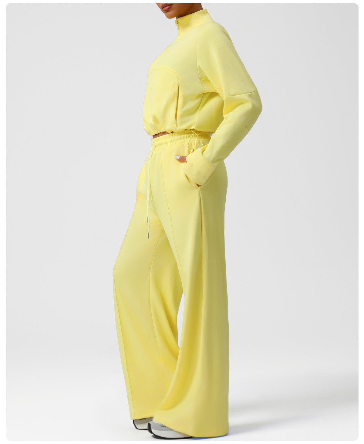 Langry fashion yellow jumpsuit with gold belt and wide-leg pants