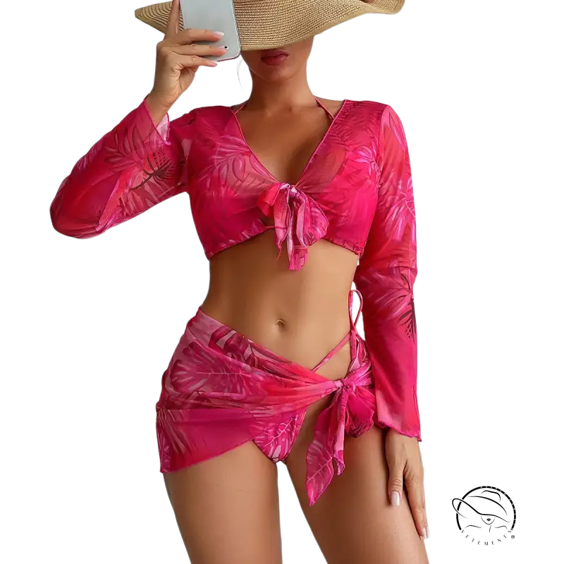 Four piece lace up swimsuit in vibrant pink with tropical leaf print