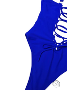 Vibrant royal blue one-piece swimsuit with lace-up back and white lining