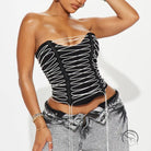 Beautiful boning corset vest in black lace-up with white accents