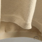 Close-up of cream-colored ribbed knit Warm Polo Collar Sweater by Langry fashion
