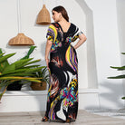Colorful butterfly-print maxi dress from Holiday Beach Dress, perfect for summer fashion and ملابس