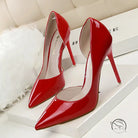 Glossy red patent leather low cut high heels with pointed toes