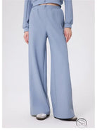 Light blue loose fitness warm pants with high waist and button detail from Zara
