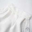 Elegant A-line dress in white with delicate lace trim