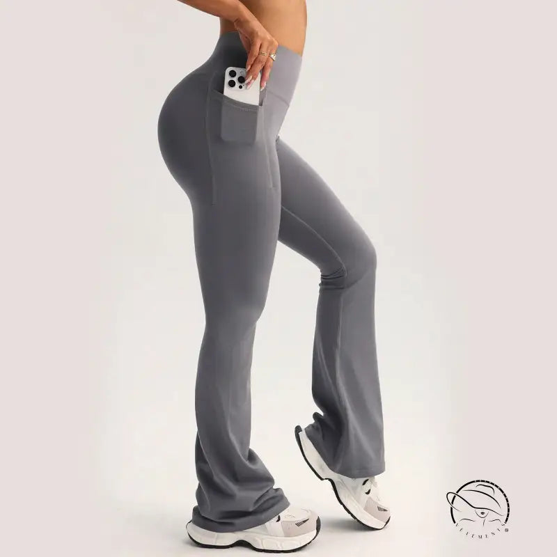 Gray high-waisted flared langry yoga pants with side phone pocket