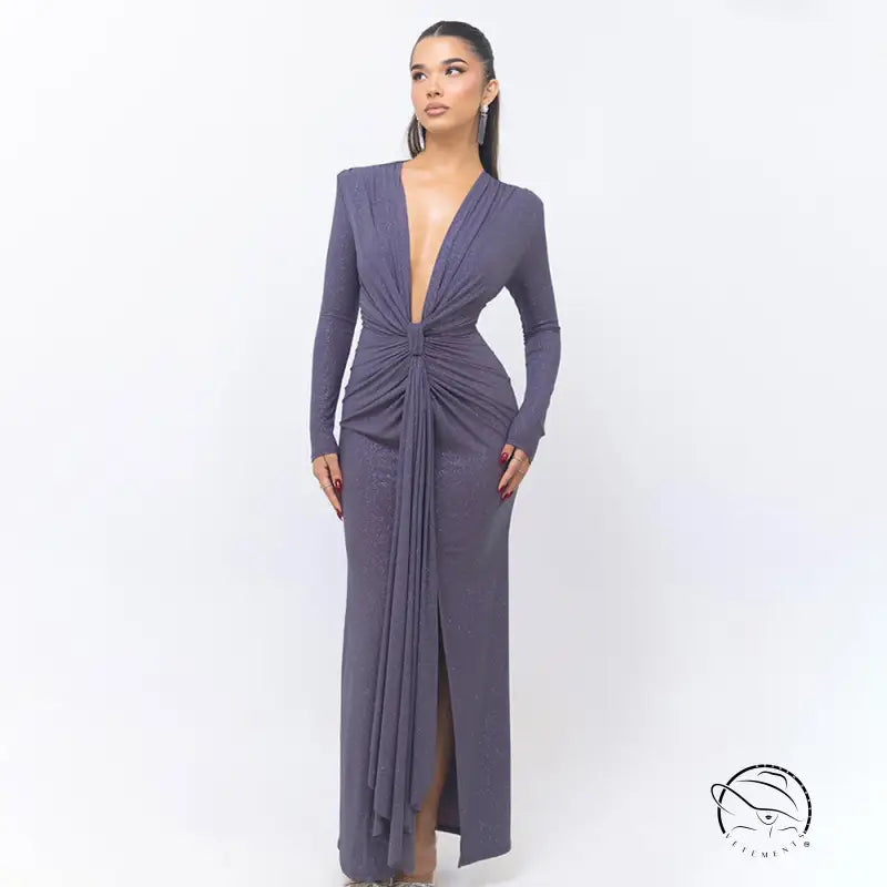 Beautiful slit slim fitting dress with long sleeves, deep V-neck, and draped gray fabric