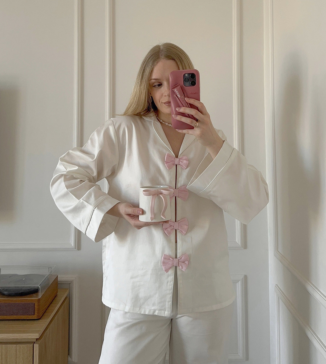 White satin langry pajama set with pink bow accents