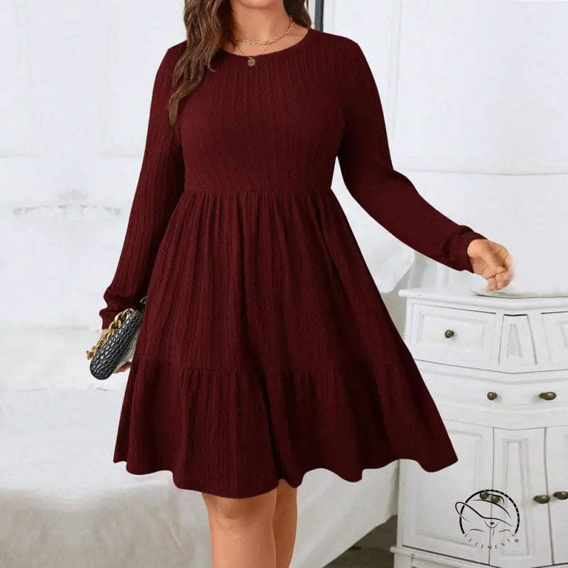 Elegant red midi dress with long sleeves and tiered maroon design