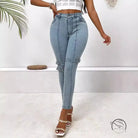 High elastic skinny jeans in light blue denim with buckle details