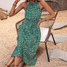 Green floral halter dress for women, perfect summer fashion piece in ملابس collection
