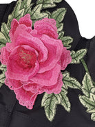 Pink rose embroidered patch on Langry fashion black corset fabric