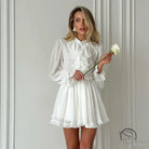 Elegant white ruffled French short dress in langry fashion ملابس