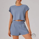 Light blue loose sports yoga fitness set with crop top and shorts