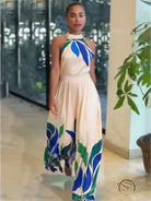 Summer printed off-white halter-neck flared shorts jumpsuit with floral pattern