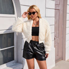 Langry fashion white fluffy faux cashmere cropped jacket with black leather shorts and crop top