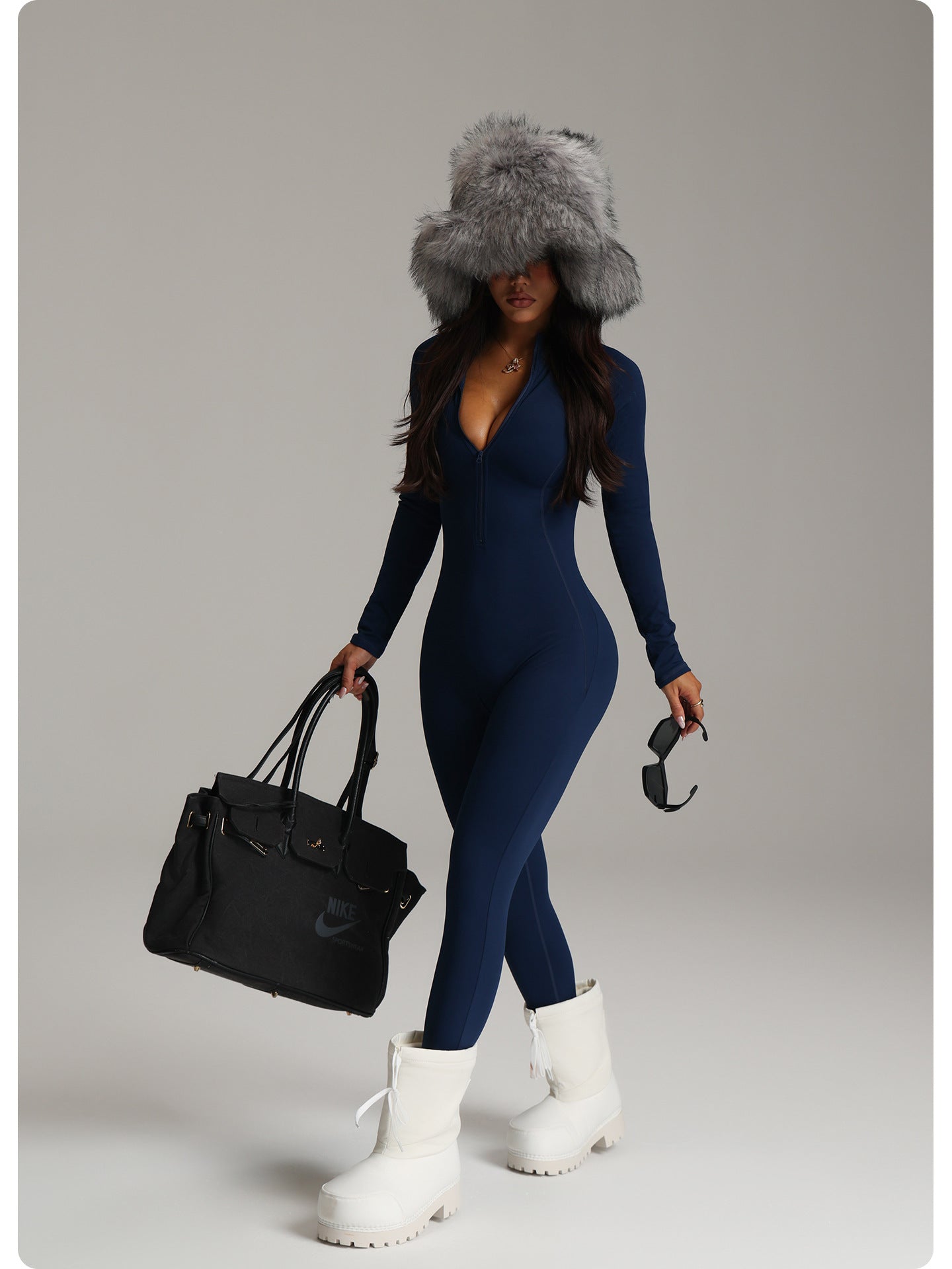 Navy blue langry fashion one-piece yoga bodysuit with fur hood and white platform boots