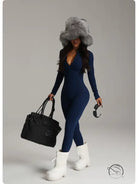 Navy blue langry fashion bodysuit with fur hood and white platform boots