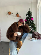 Gorgeous faux fur fox jacket in brown with red cap and jeans, Langry fashion