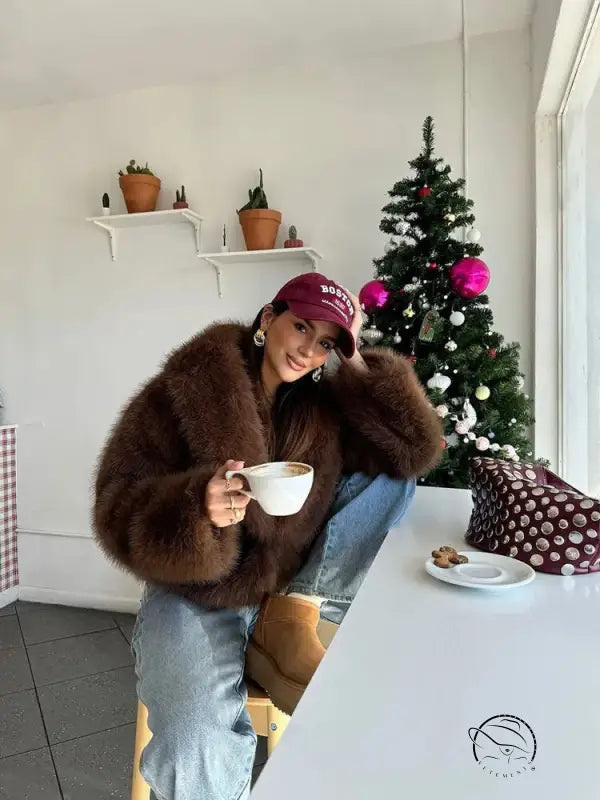 Gorgeous faux fur fox jacket in brown with red cap and jeans