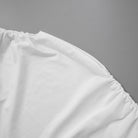 White fabric with gathered edges in a Women’s Summer Solid Color Fashion Vest Top