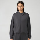 Gray zip-up hooded sweatshirt for women, ideal for fitness and autumn winter fashion