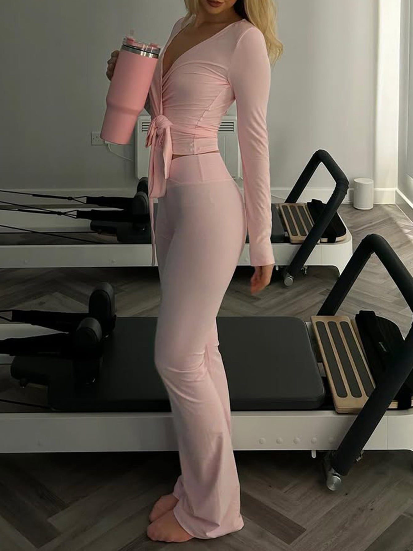 Pink insulated travel mug with silver lid and black grip band in Langry fashion ملابس