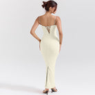 Cream-colored split dress featuring a corset back, ideal for autumn fashion elegance