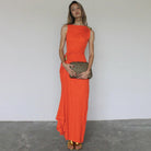 Elegant langry fashion sleeveless maxi dress in orange with gold sandals