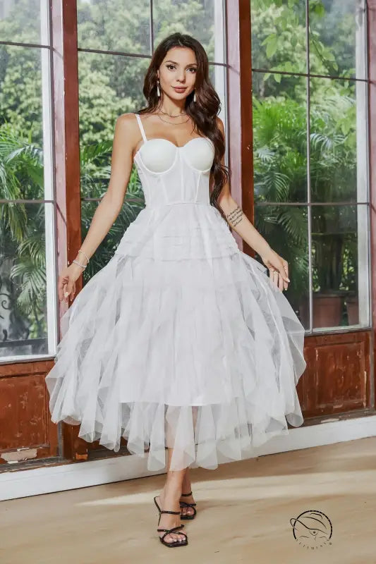 White tiered tulle dress with french tube top and white yarn straps