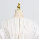 Langry fashion white pleated ruffled short dress with gold zipper and headpiece