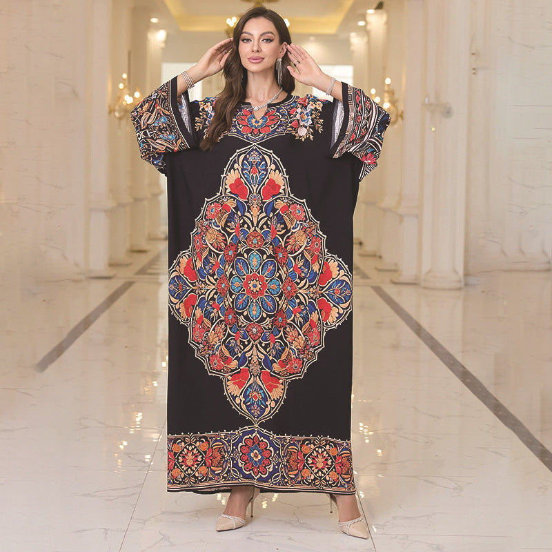 Elegant black floral kaftan dress with mandala pattern and batwing sleeve length