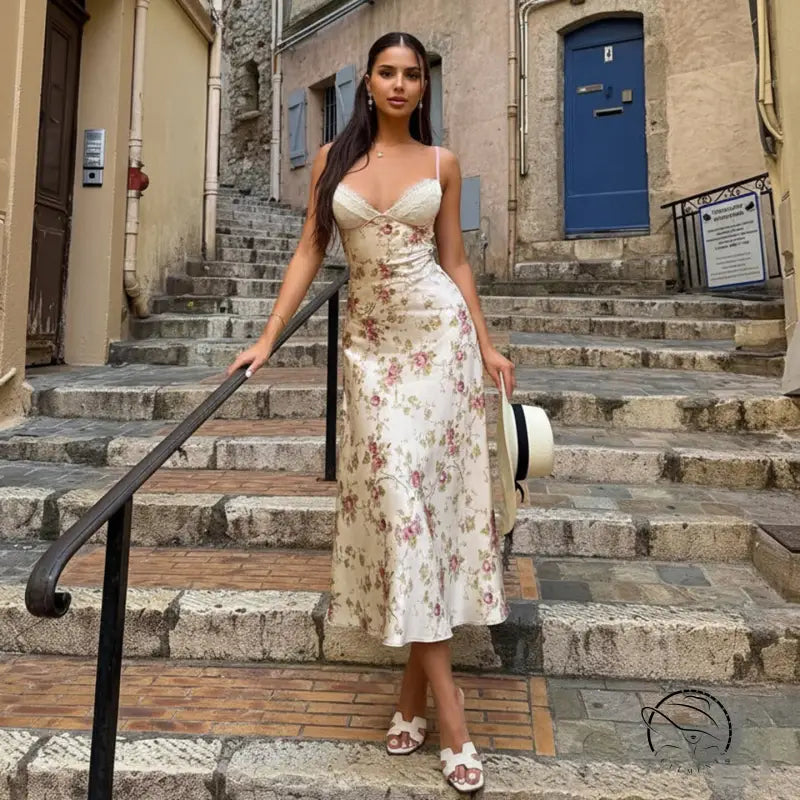 Elegant langry floral A-line maxi dress in off-white satin with pink and green embroidery