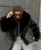 Faux fur effect plush coat in black with silver fox trim and brown bandana