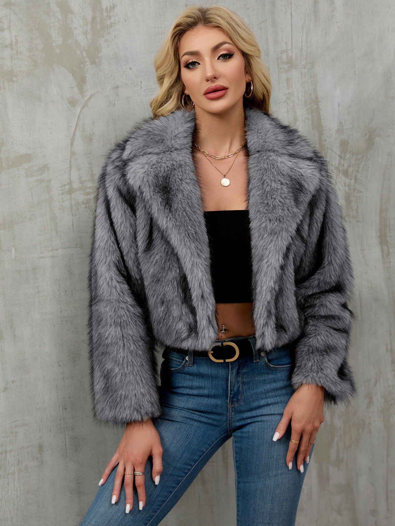 Gray faux fur cropped jacket with plush textured surface and oversized collar