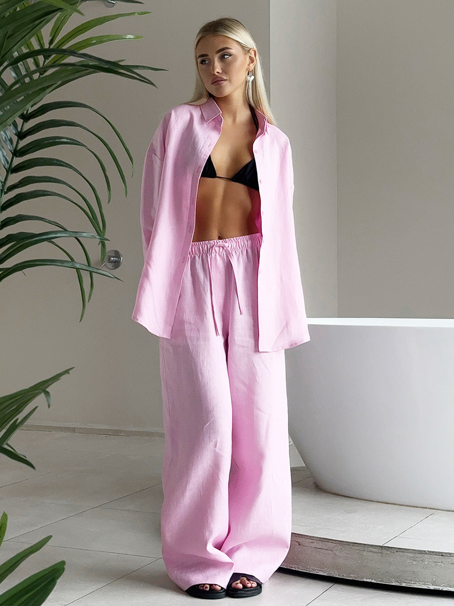 Woman wearing pink linen pajama set from Cotton Shirt Trousers Casual Sets, a stylish ملابس