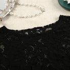 Black lace top with round neckline in fashionable pajamas lace design slit shorts