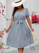 Light blue floral summer dress with square neck, puff sleeves, tie waist