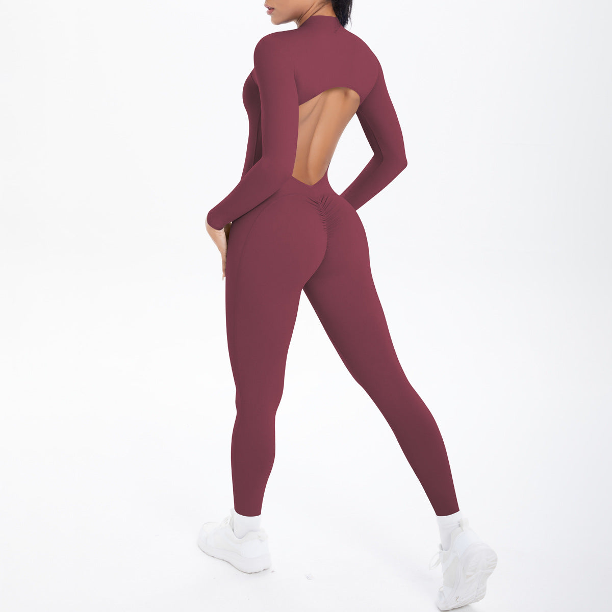 Maroon long sleeve yoga bodysuit with back cutout and high-waisted leggings