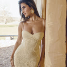 Elegant lace-covered cami dress showcasing exquisite design in contemporary fashion