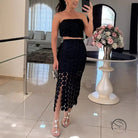 Woman in black two-piece casual loose vacation set