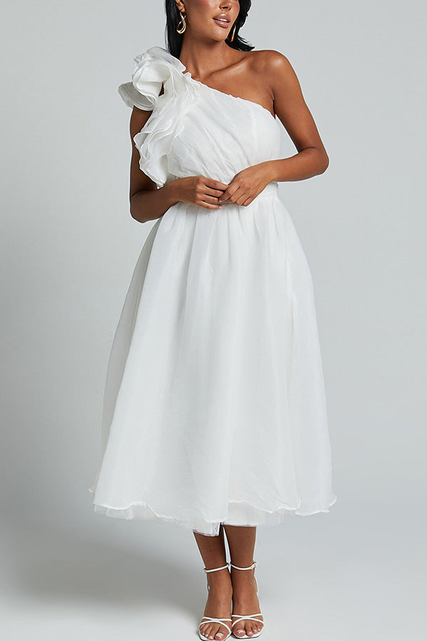 Elegant one-shoulder white midi dress with ruffled detail, a stunning fashion choice