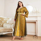 Woman in gold yellow Moroccan long sleeve A-line dress with lace trim